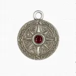 Silver pendant compass with ruby