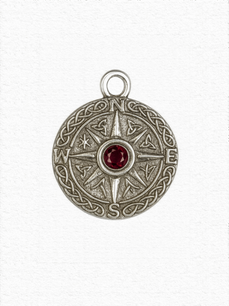 Silver pendant compass with ruby