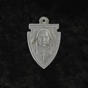 silver pendant of crazy horse, native American