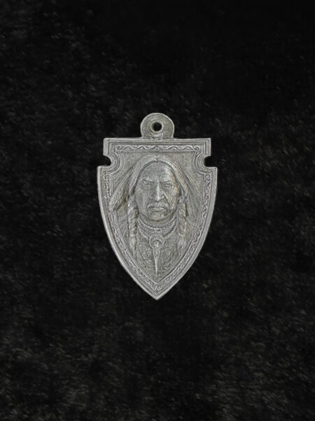 silver pendant of crazy horse, native American