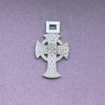 Silver Celtic ornated cross with intricate design
