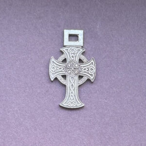 Silver Celtic ornated cross with intricate design