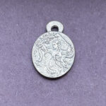 Silver pendant with intricate design geisha with swords