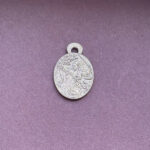 Silver pendant with intricate design geisha with swords