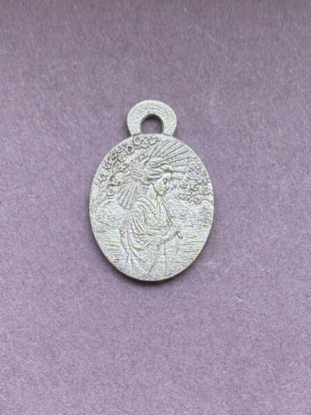 Silver pendant with intricate design geisha