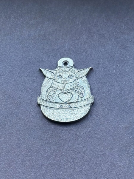 Silver pendant Grogu inspired pendant of a cute child character