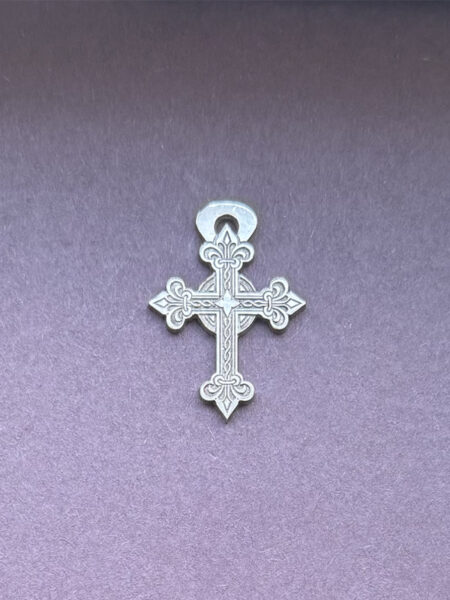 Silver ornated cross
