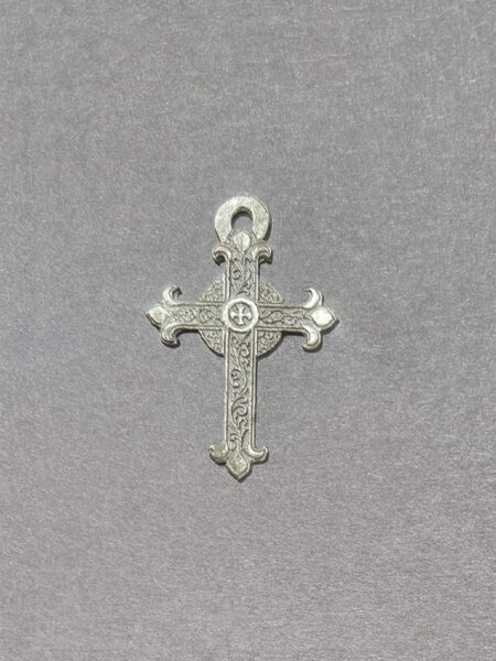 ornated silver cross pendant