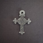 ornated silver cross pendant